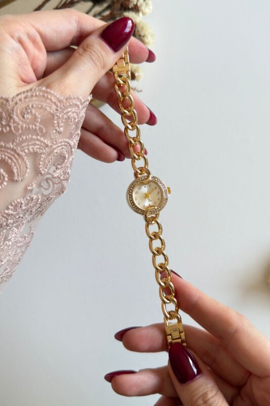 Eleni Ekru Sworaski Taşlı Kadran Gold Kordon Kadın Kol Saati (1)