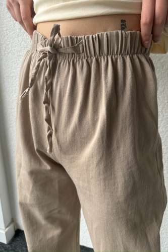 PNT-07379 Taş Rengi Paça Püsküllü Bel Lastik Ve İp Detay Keten Kumaş Salaş Pantolon - Thumbnail