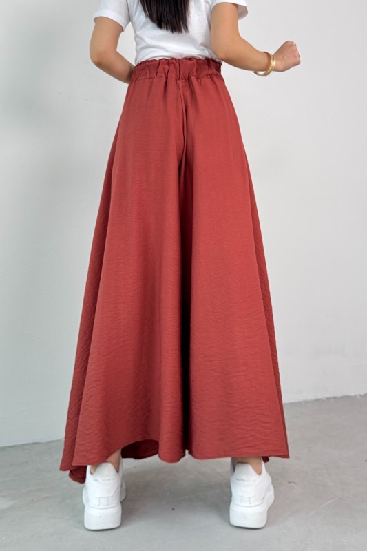 PNT-07410 Tarçın Rengi Dokuma Kuşaklı Şalvar Etek Pantolon